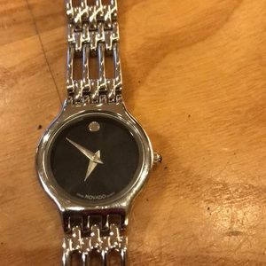 Movado women’s stainless steel watch. New Battery